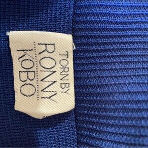 Skirt with pleaded button worn once